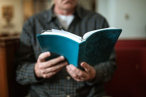 Man reading bible